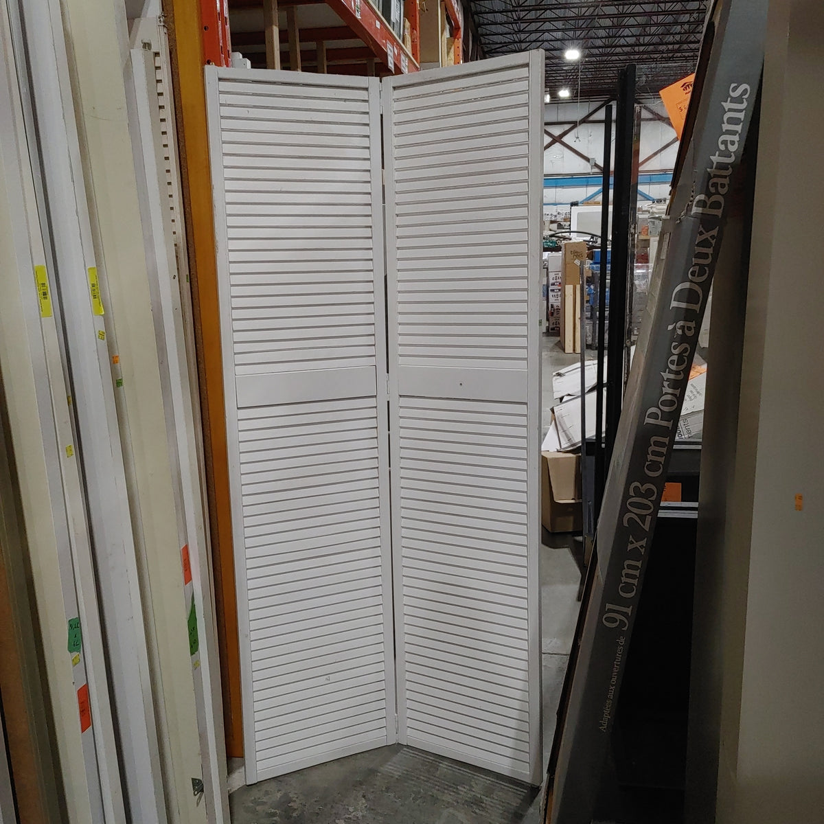 White shuttered bifold doors Habitat for Humanity Greater Ottawa ReStore
