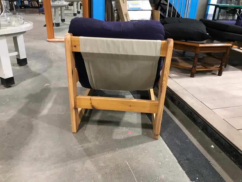 Wooden blue armchair with navy blue cushions
