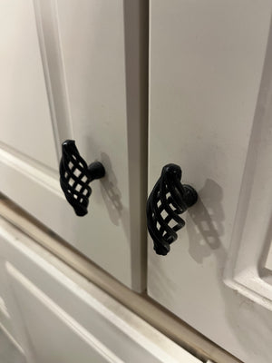 Cream Kitchen with Black Spiral Knobs