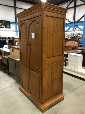 Tall Wooden Media Unit With Ornate Top