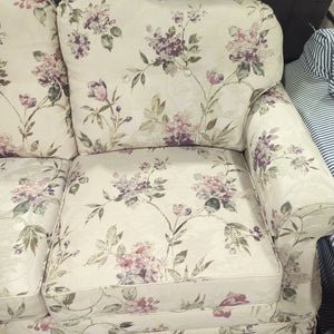 Cream Coloured Couch with Floral Pattern