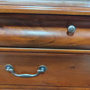 Curved dark nightstand