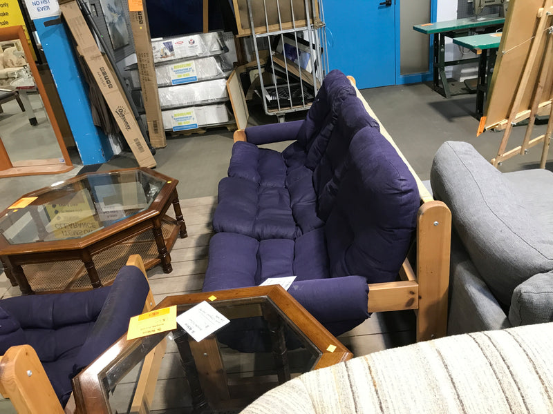 Wooden based 3 seater sofa with navy blue cushions