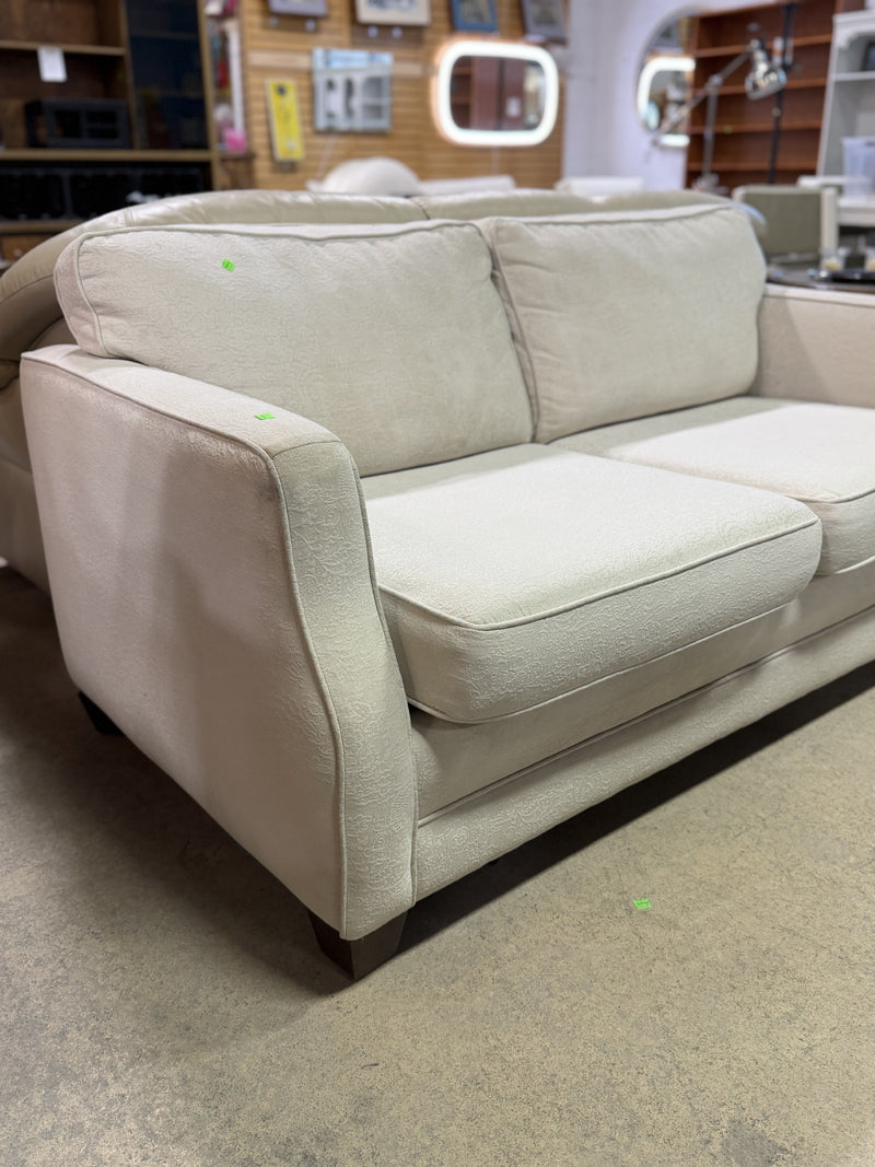 Classic Neutral Two-Seat Sofa – Soft Cream Upholstery