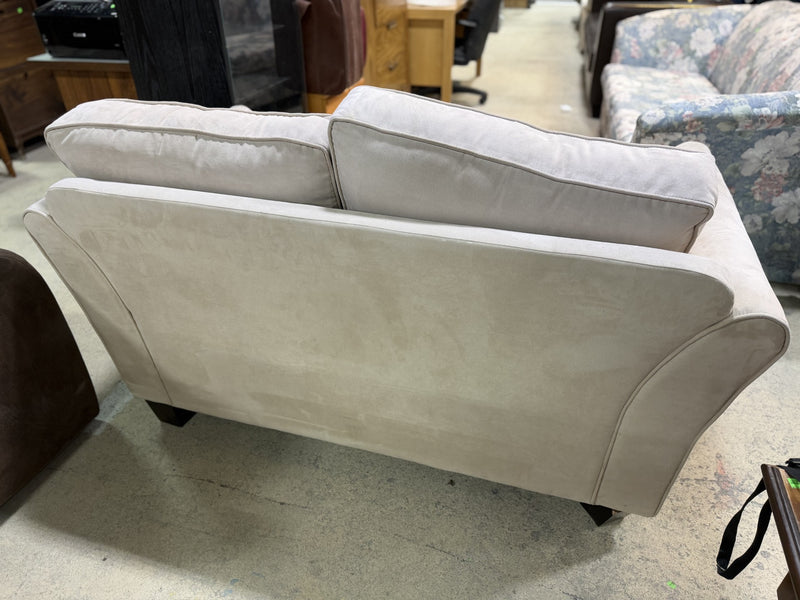 Plush Beige Loveseat with Rolled Arms