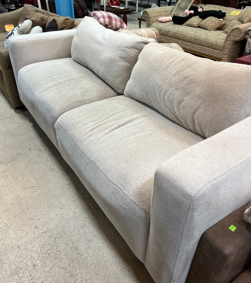 Contemporary Beige Oversized Sofa with Plush Cushions and Modern Track Arms