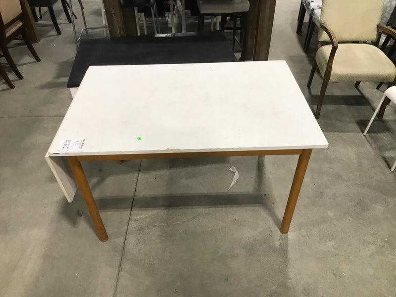 White dining table with folding sides