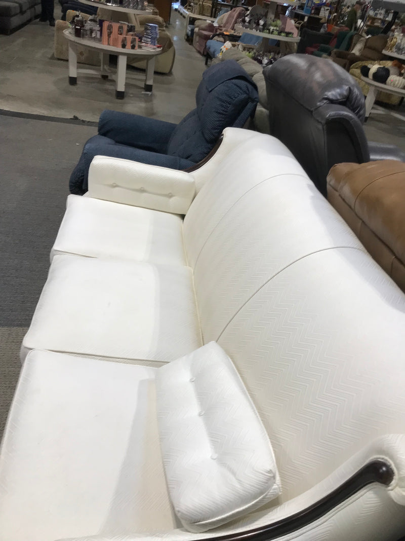 White Couch With Black Wood Accent