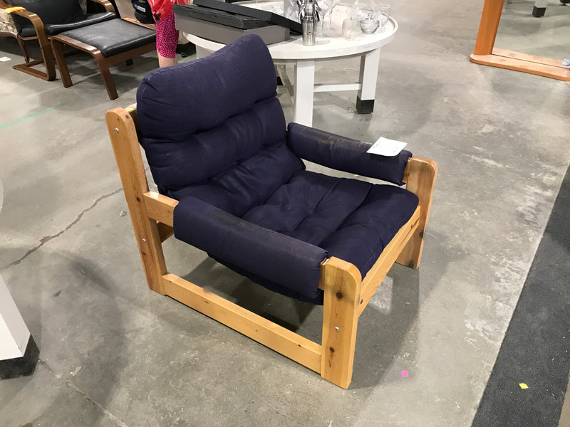 Wooden blue armchair with navy blue cushions