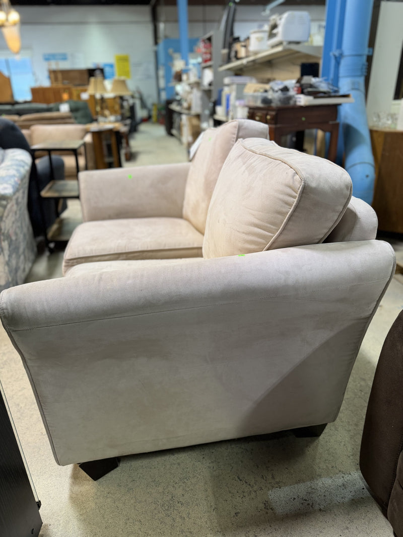 Plush Beige Loveseat with Rolled Arms