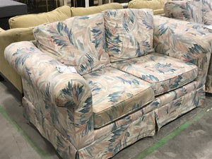 2-Seater White Couch With Blue and Pink Leaves