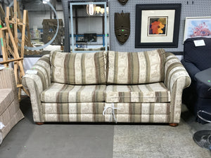 Green and brown sofa bed