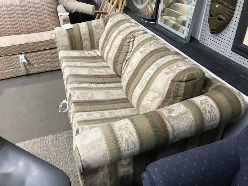 Green and brown sofa bed