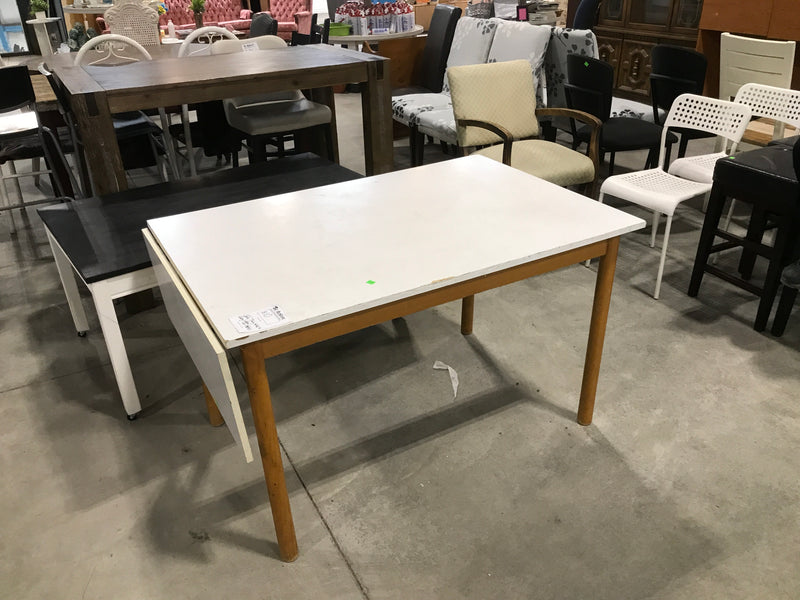 White dining table with folding sides