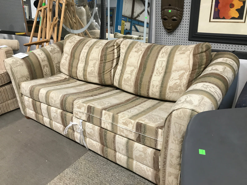 Green and brown sofa bed