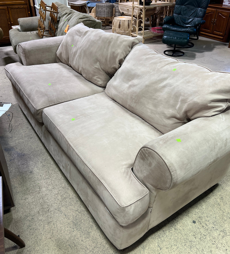 Plush Beige Upholstered Sofa with Rolled Arms & Two-Cushion Design
