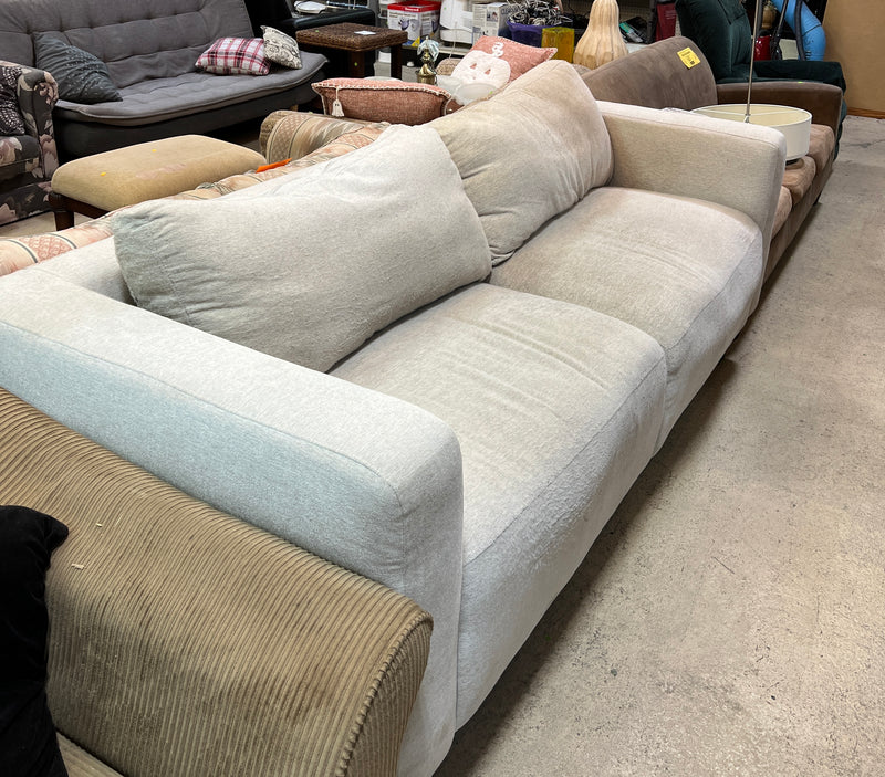 Contemporary Beige Oversized Sofa with Plush Cushions and Modern Track Arms