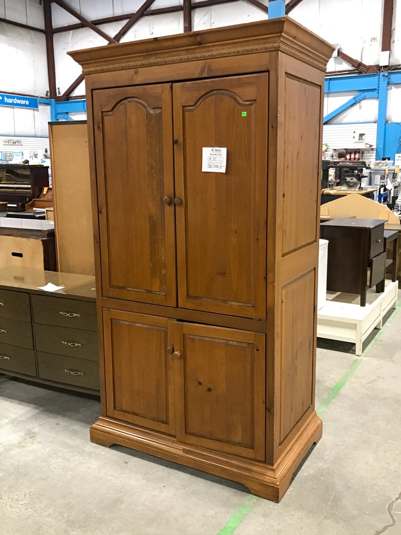 Tall Wooden Media Unit With Ornate Top