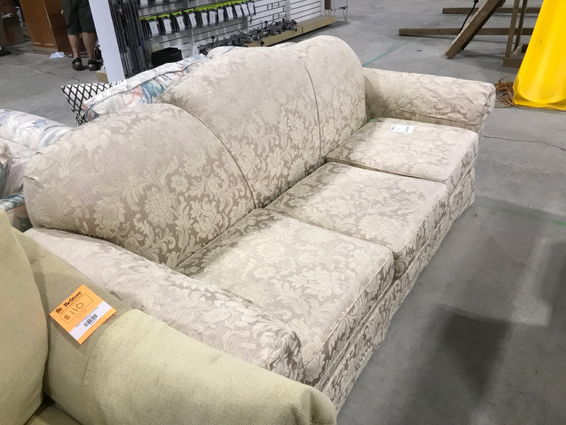 Cream patterned 3-seater couch