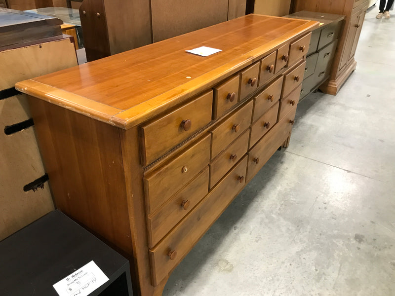 Eight Drawer Light Brown Dresser