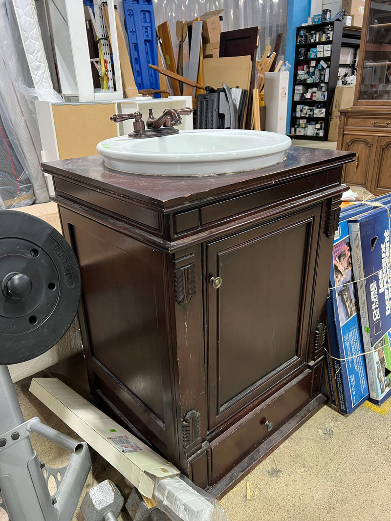Traditional Dark Wood Single-Sink Bathroom Vanity with Ornate Bronze Faucet