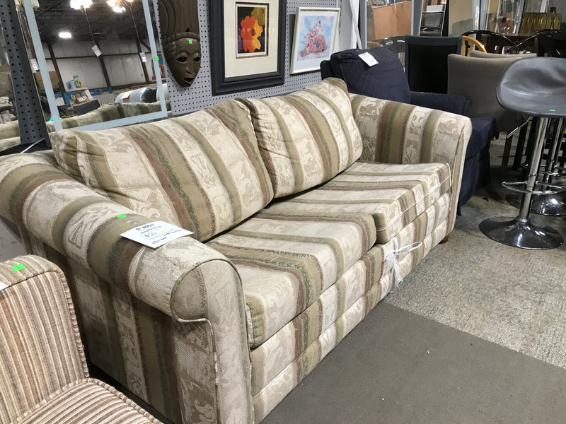 Green and brown sofa bed