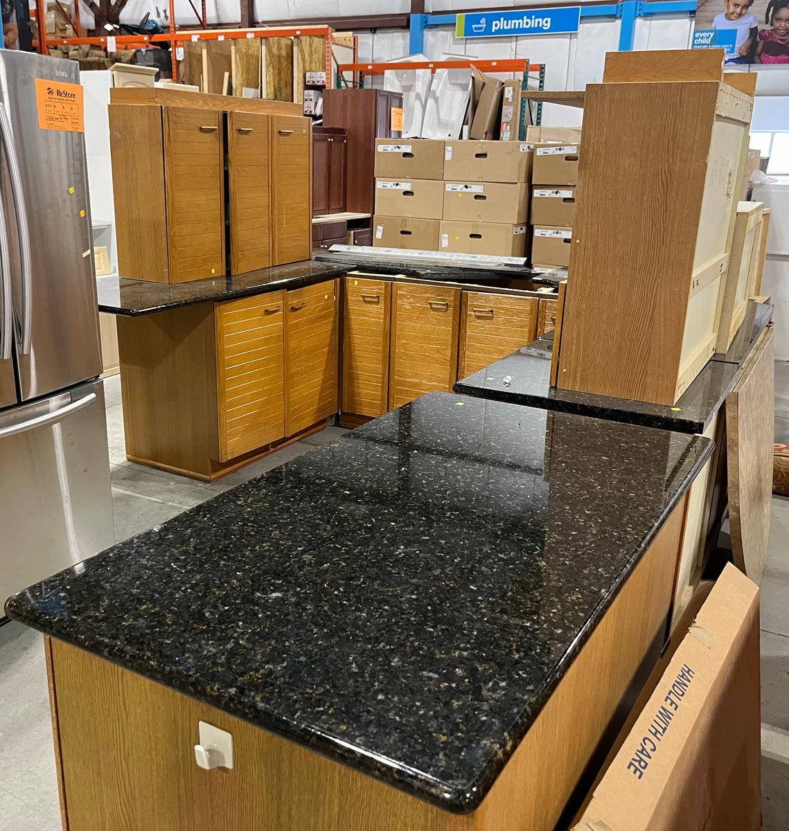 Honey Brown Kitchen w/ Black Granite Countertops, Wooden Hardware and Habitat for Humanity