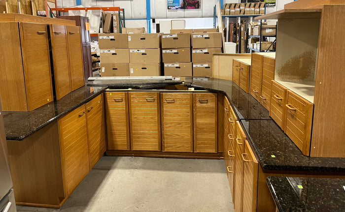 Honey Brown Kitchen w/ Black Granite Countertops, Wooden Hardware and Small Island