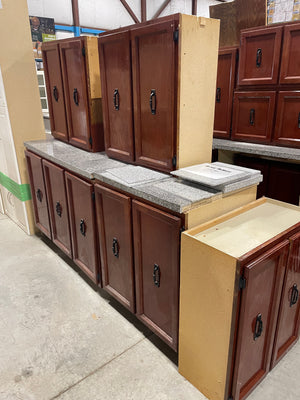 Red-Toned Kitchen Set with Tile Top Counters