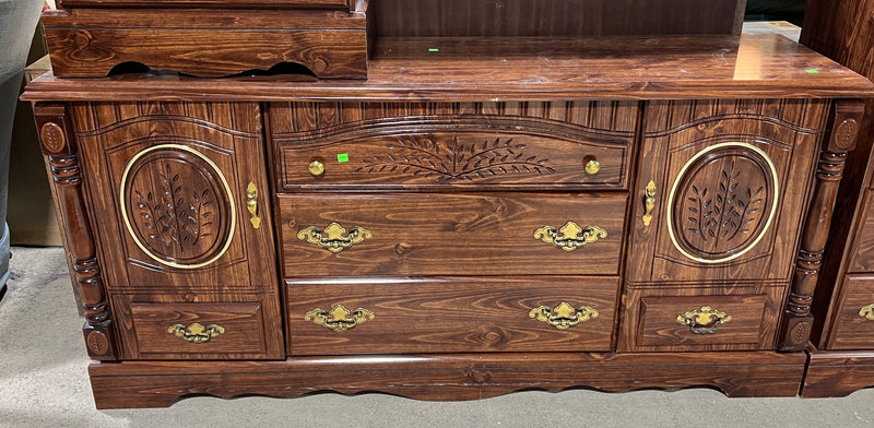 Traditional Dark Wood Dresser with Carved Details