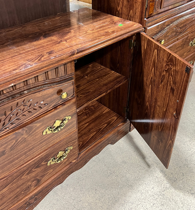 Traditional Dark Wood Dresser with Carved Details