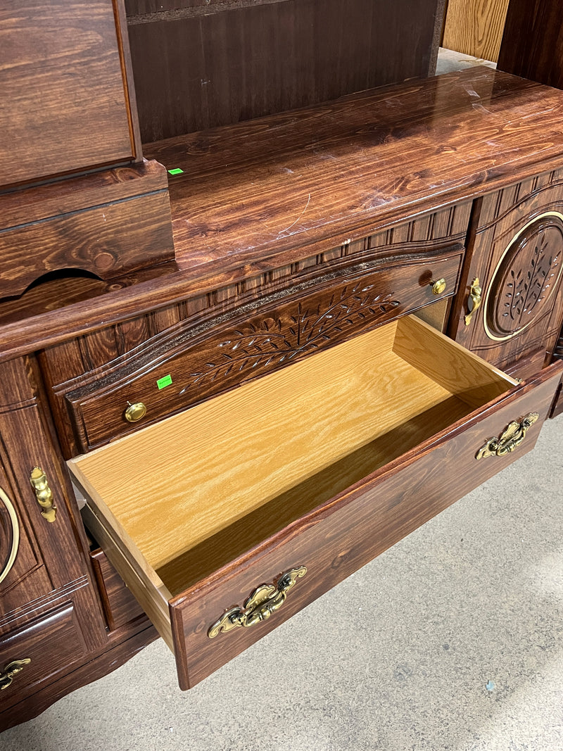 Traditional Dark Wood Dresser with Carved Details