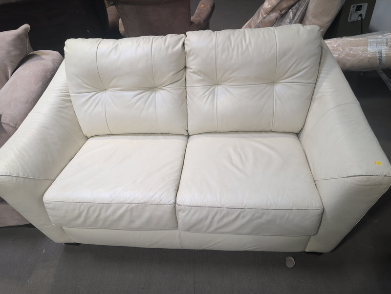 Cream Colored Leather Loveseat