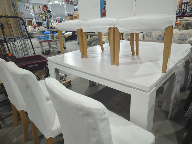 White Rectangular Dining Table with 6 White Chairs
