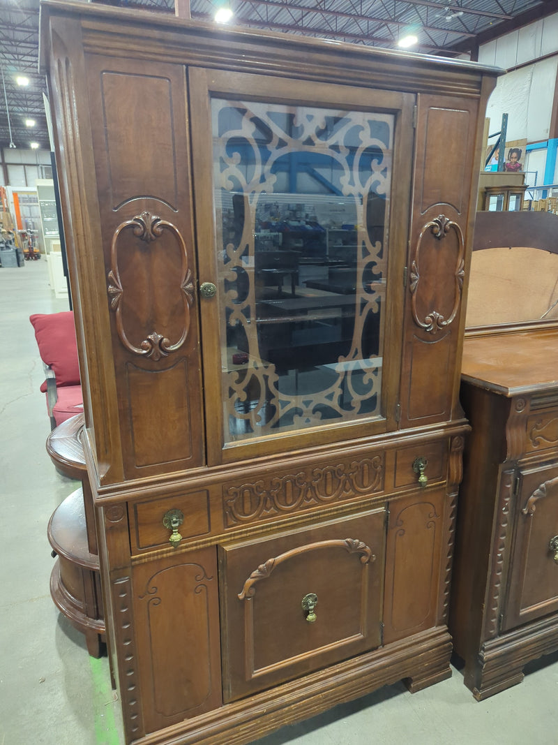 Antique Wooden Cabinet with Ornate Carved Details