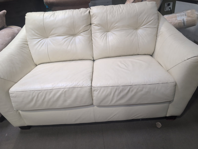 Cream Colored Leather Loveseat