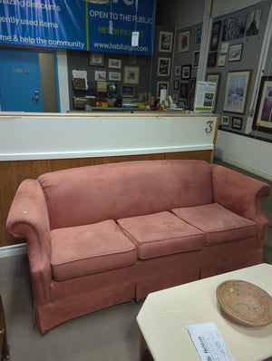 Salmon coloured microfiber couch