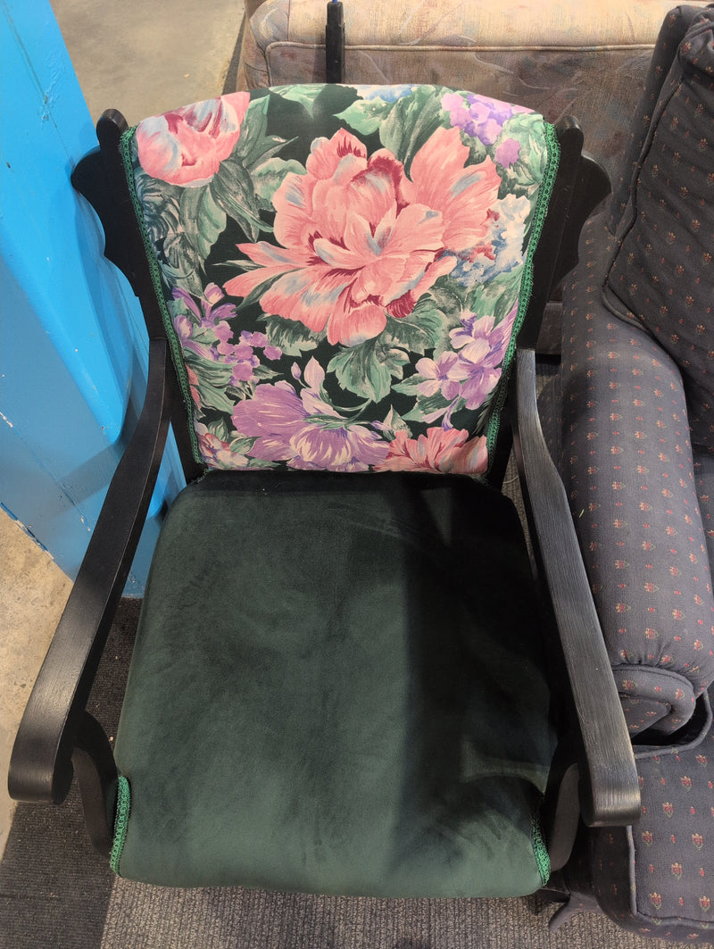Black Armchair with Green Fabric and Floral Designs