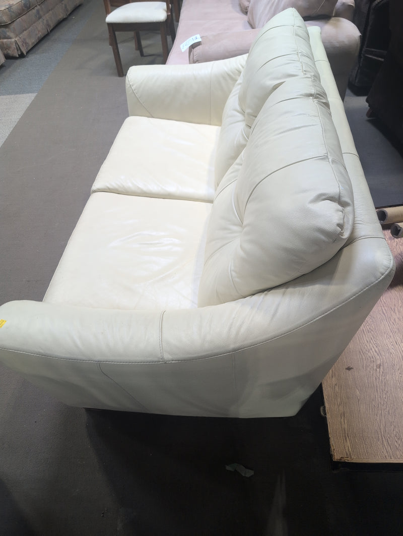 Cream Colored Leather Loveseat