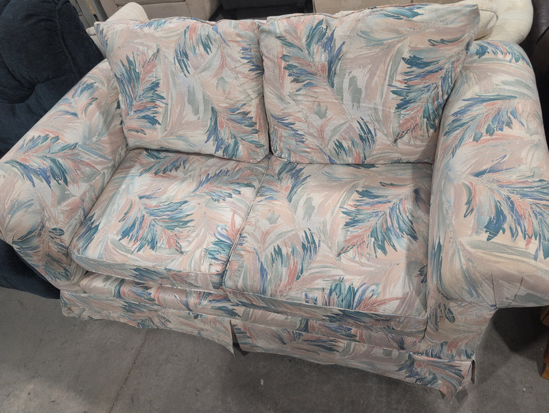 Pink, Blue, Teal, and White Loveseat