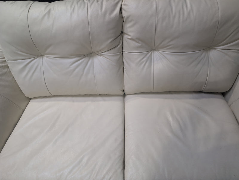 Cream Colored Leather Loveseat