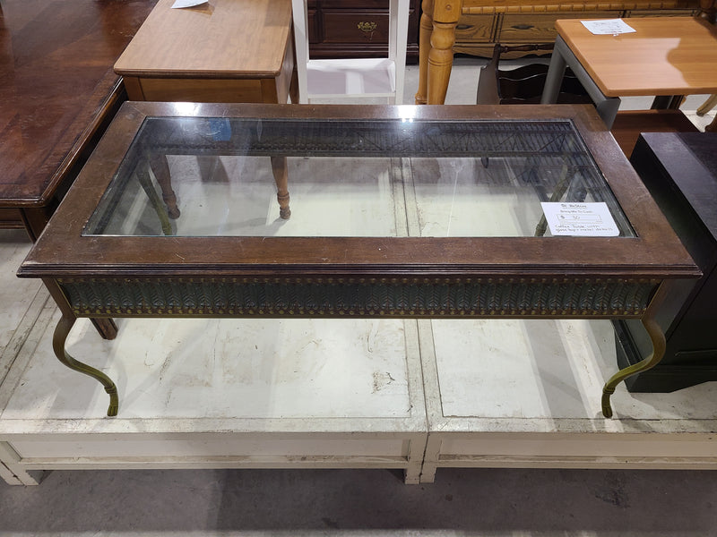 Elegant Coffee Table with Glass Top and Metal Details