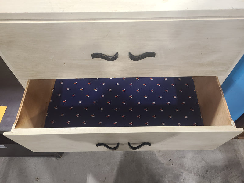 White 4-Drawer Dresser with Black Handles