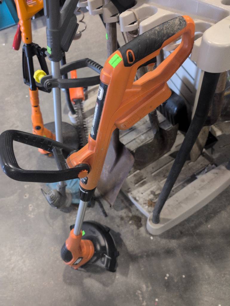 Orange and Black Battery Powered Stringtrimmer