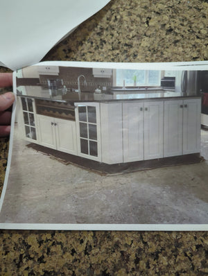 White kitchen with large island