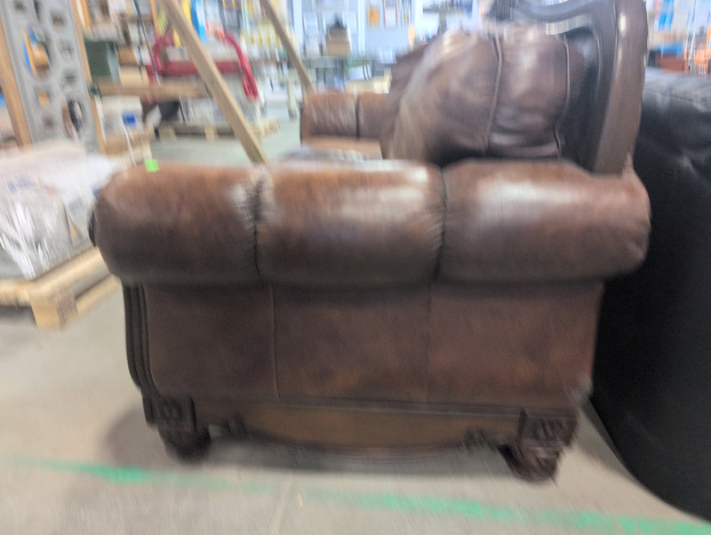 Leather Sofa with Ornate Wooden Framing