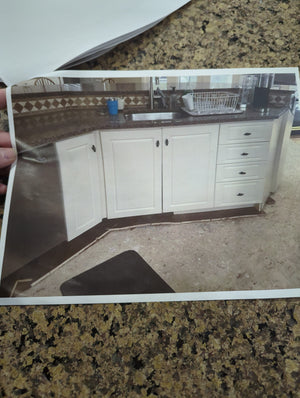 White kitchen with large island