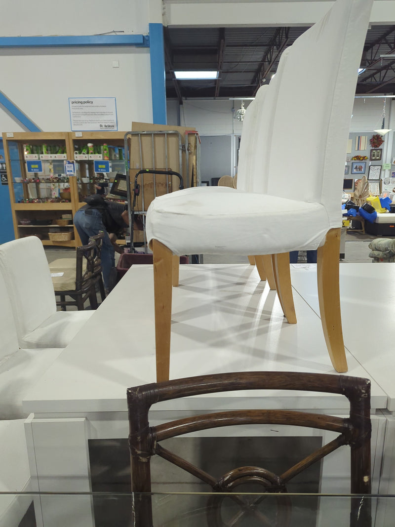 White Rectangular Dining Table with 6 White Chairs