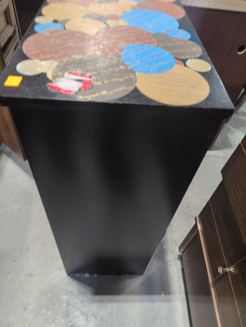 Black Accent Cabinet with Transparent Doors and Colorful Tabletop