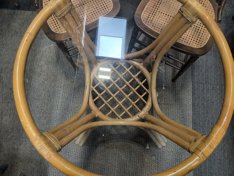 Round Glass Dining Table with a Rattan Body